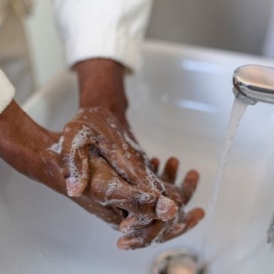 Hands washing with soap